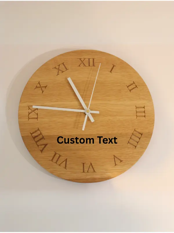 Handmade oak clock engraved with Roman numerals I to XII, A personalised wooden wall clock with optional engraving for names, dates, messages, or logos.